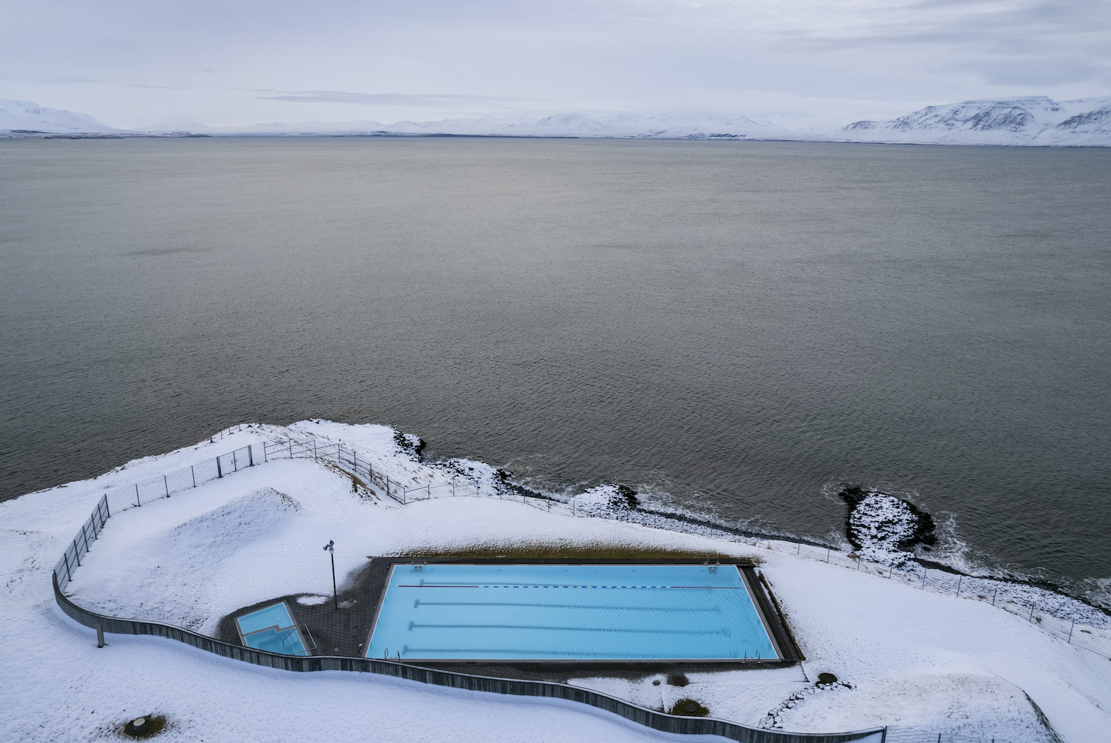 Aerial View of Swimming Pool Near the Ocean