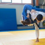 A Judoka Throwing an Opponent to the Ground